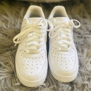 All white Air Force 1 ‘07 sneakers
